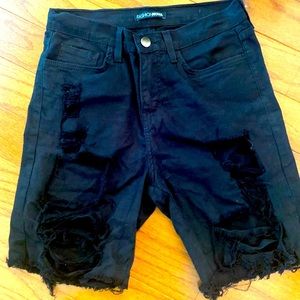 Black denim cutout shorts.